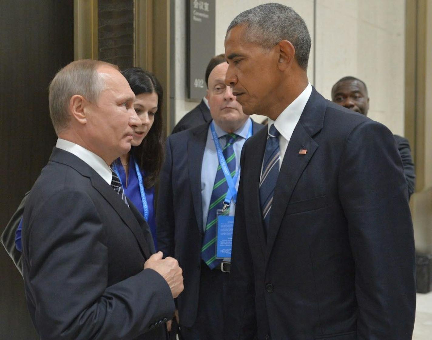 Russian President Vladimir Putin, left, speaks with U.S. President Barack Obama in Hangzhou in eastern China's Zhejiang province, Monday, Sept. 5, 2016.