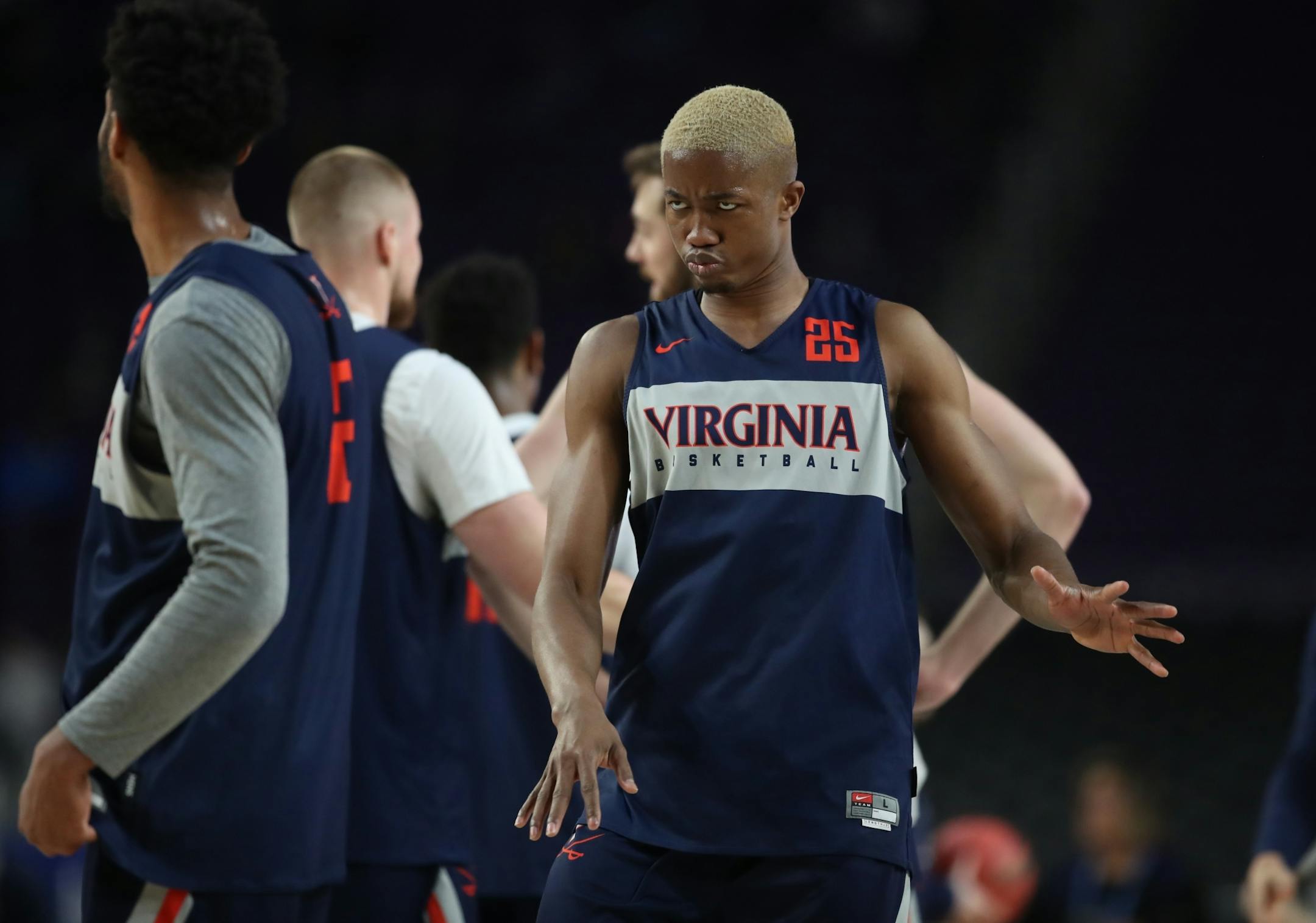 Virginia Cavaliers forward Mamadi Diakite (25) joked during team practice.