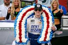 Ryan Blaney celebrated in Victory Lane after winning a NASCAR Cup Series race at Talladega Superspeedway on Monday.