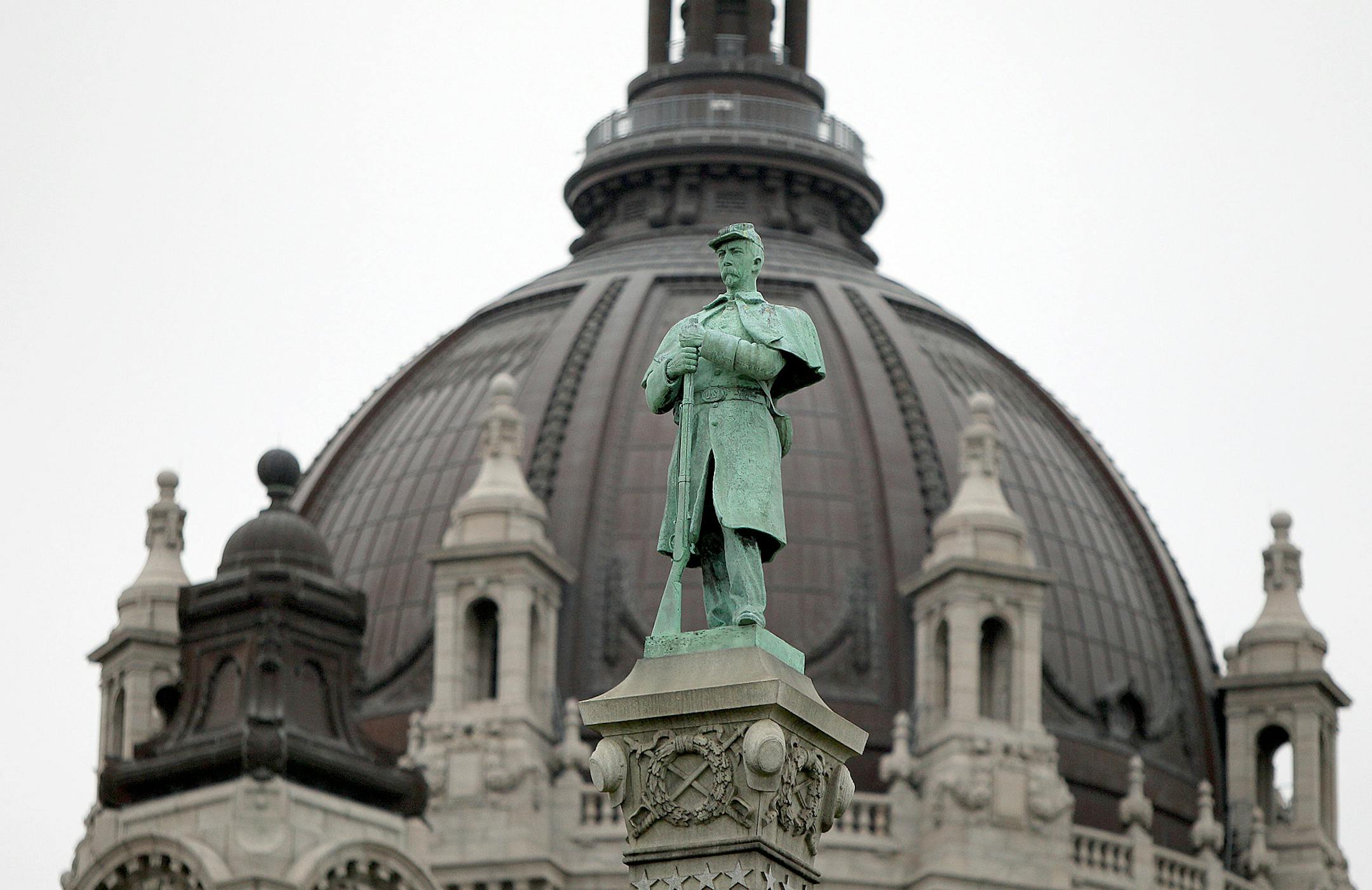 The statue of Josias R. King, with the St. Paul Cathedral in the background, represents the Minnesotans who fought in the Civil War. King fought in the legendary First Minnesota regiment.