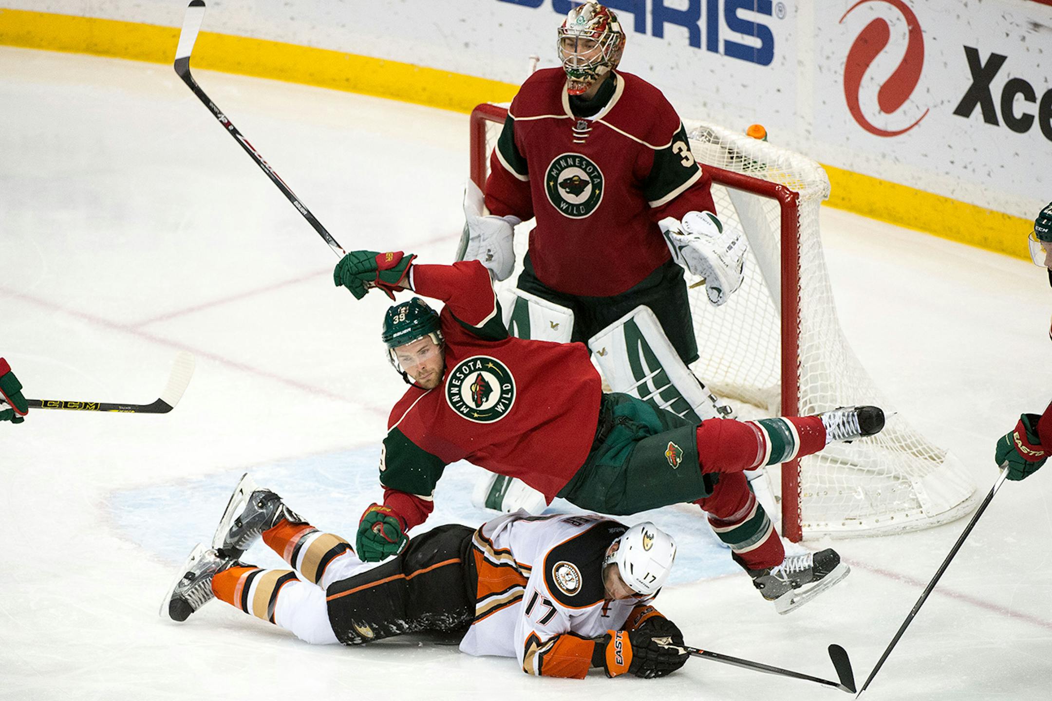Anaheim Ducks center Ryan Kesler (17) takes the feet of from under Minnesota Wild defenseman Nate Prosser (39) in front of the Wild's goal during the third period.