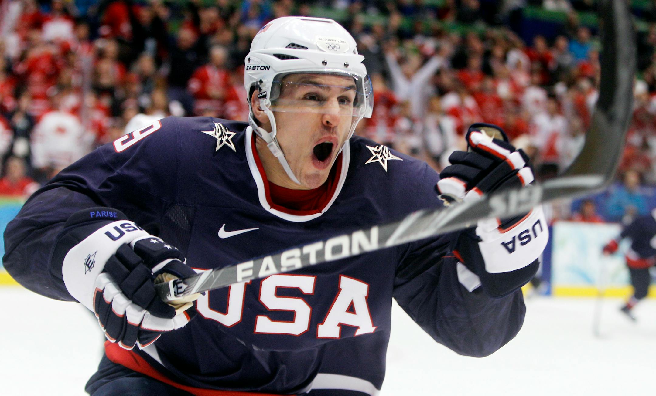 FILE - In this Feb. 28, 2010, file photo, USA's Zach Parise (9) celebrates after scoring a goal in the third period of the men's gold medal ice hockey game against Canada at the Vancouver 2010 Olympics in Vancouver, British Columbia. Parise, of the Minnesota Wild, will be the captain of the U.S. men's hockey team at the Sochi Olympics. (AP Photo/Gene J. Puskar, File)