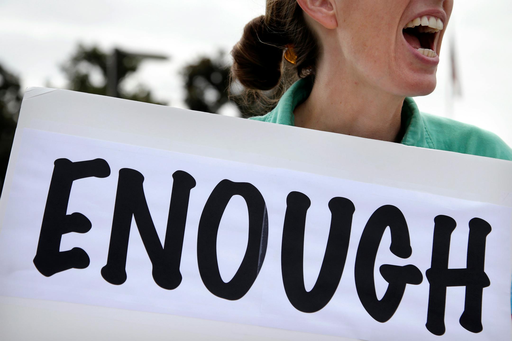 Vicki Maturo, of Culver City, Calif., protested against the government shutdown outside the federal building in Los Angeles on Wednesday, Oct. 2, 2013.