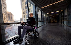 Star Tribune reporter James Walsh makes his way through the skyway to enter St. Paul City Hall on Feb. 29. He wrote in a recent story about becoming t