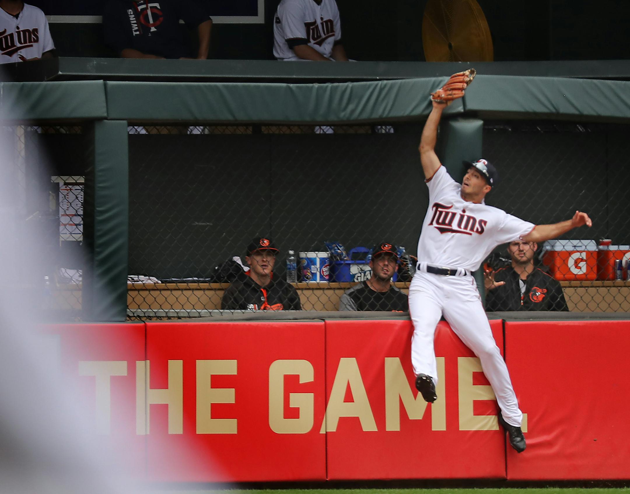 Twins center fielder Zach Granite caught a line drive up against the fence that was hit by the Orioles' Ruben Tejada in the fourth inning Sunday.