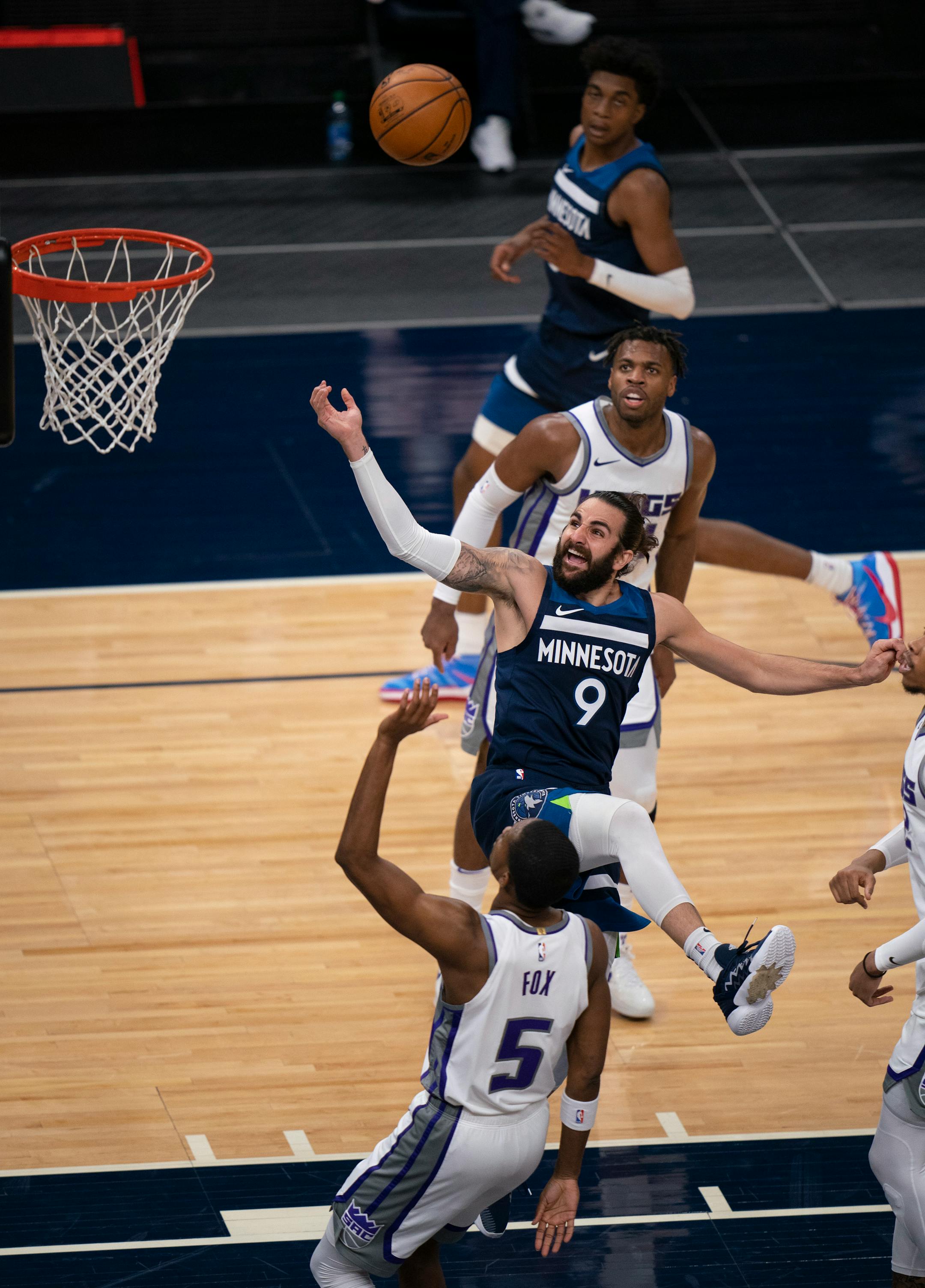 Minnesota Timberwolves guard Ricky Rubio (9) was fouled by Sacramento Kings guard De'Aaron Fox (5) in the first quarter.