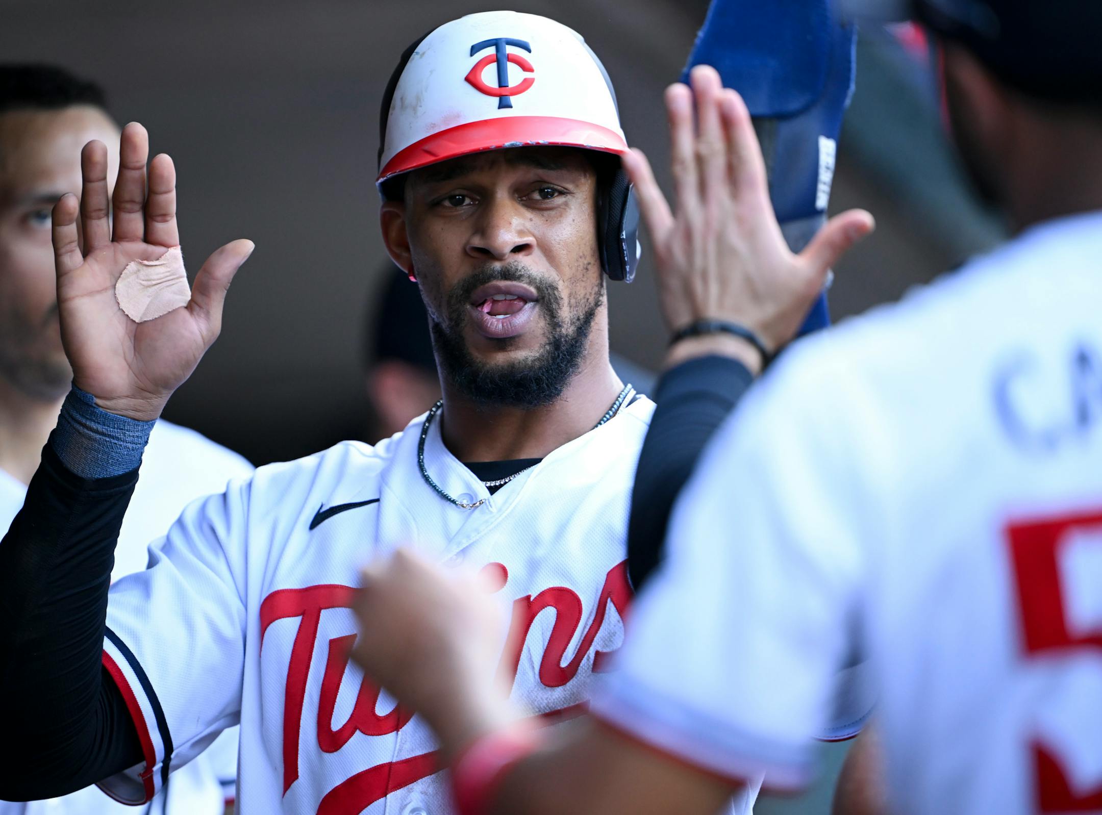 Minnesota Twins designated hitter Byron Buxton (25) reacts after scoring a run off a single hit by right fielder Max Kepler (26) in the bottom of the second inning against the Boston Red Sox Wednesday, June 21, 2023, at Target Field in Minneapolis, Minn.