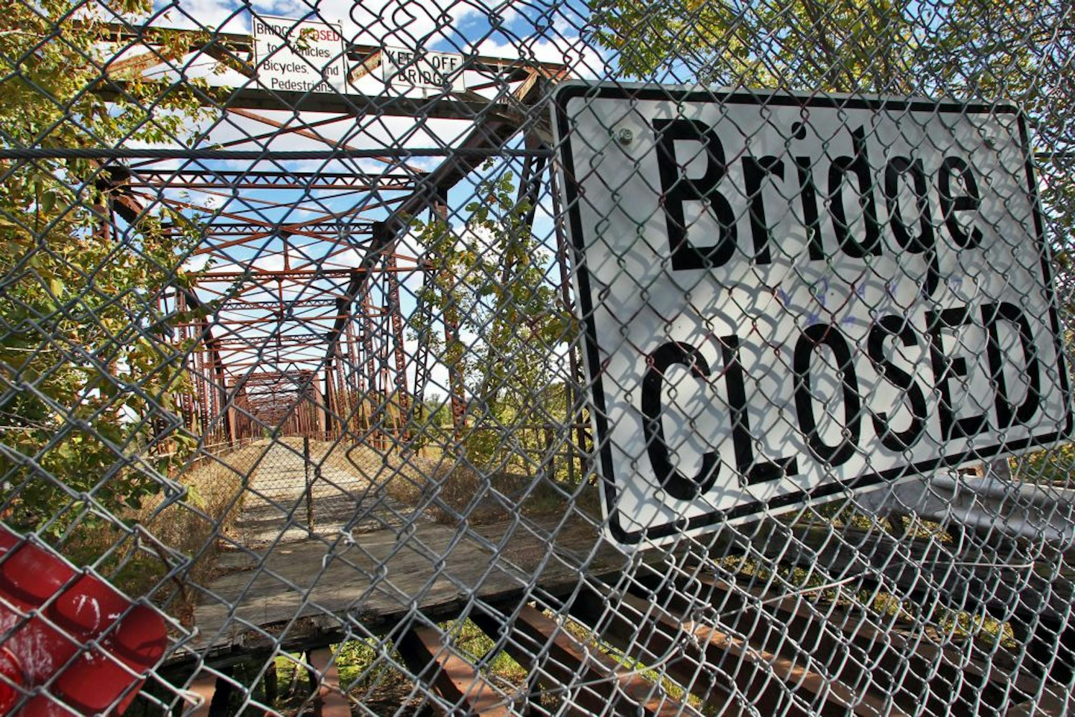 The Old Cedar Avenue Bridge in Bloomington crosses Long Meadow Lake in the Minnesota Valley National Wildlife Refuge. It has been closed since 2002.