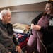 While his grandson Bill Homan III helped hang a picture in the background, WWII vet Bill Homan joked with LPN Shelly Danielson on Monday at a new vete