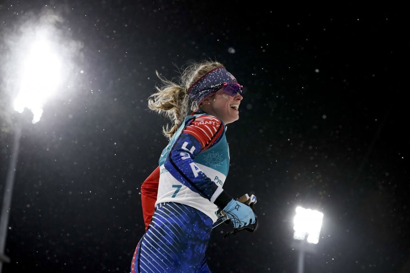 Jessica Diggins, of the United States, smiles after finishing second in the first semifinal of the women's cross-country skiing sprint classic at the 2018 Winter Olympics in Pyeongchang, South Korea, Tuesday, Feb. 13, 2018.