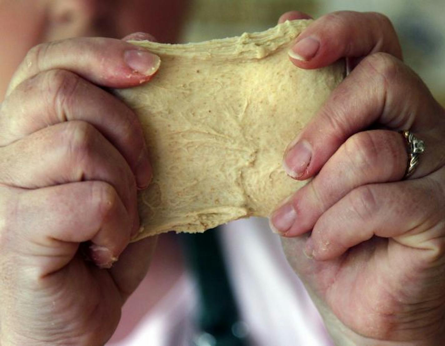 Dough should pass the windowpane test – stretched until almost transparent.