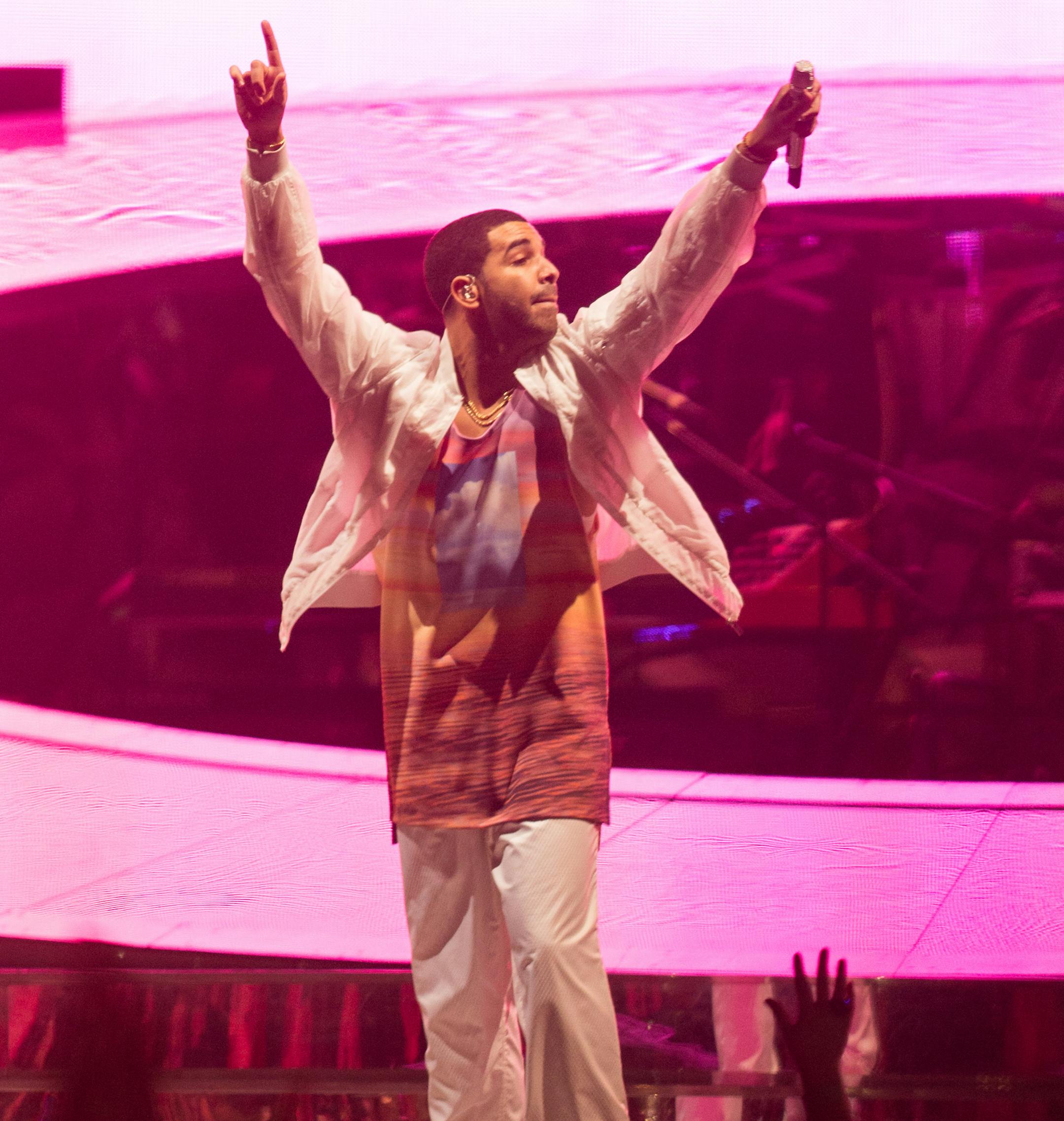 Recording artist Drake performs on stage at the Staples Center on Monday, November 25, 2013 in Los Angeles, Cailf. (Photo by Paul A. Hebert/Invision/AP) ORG XMIT: INVW