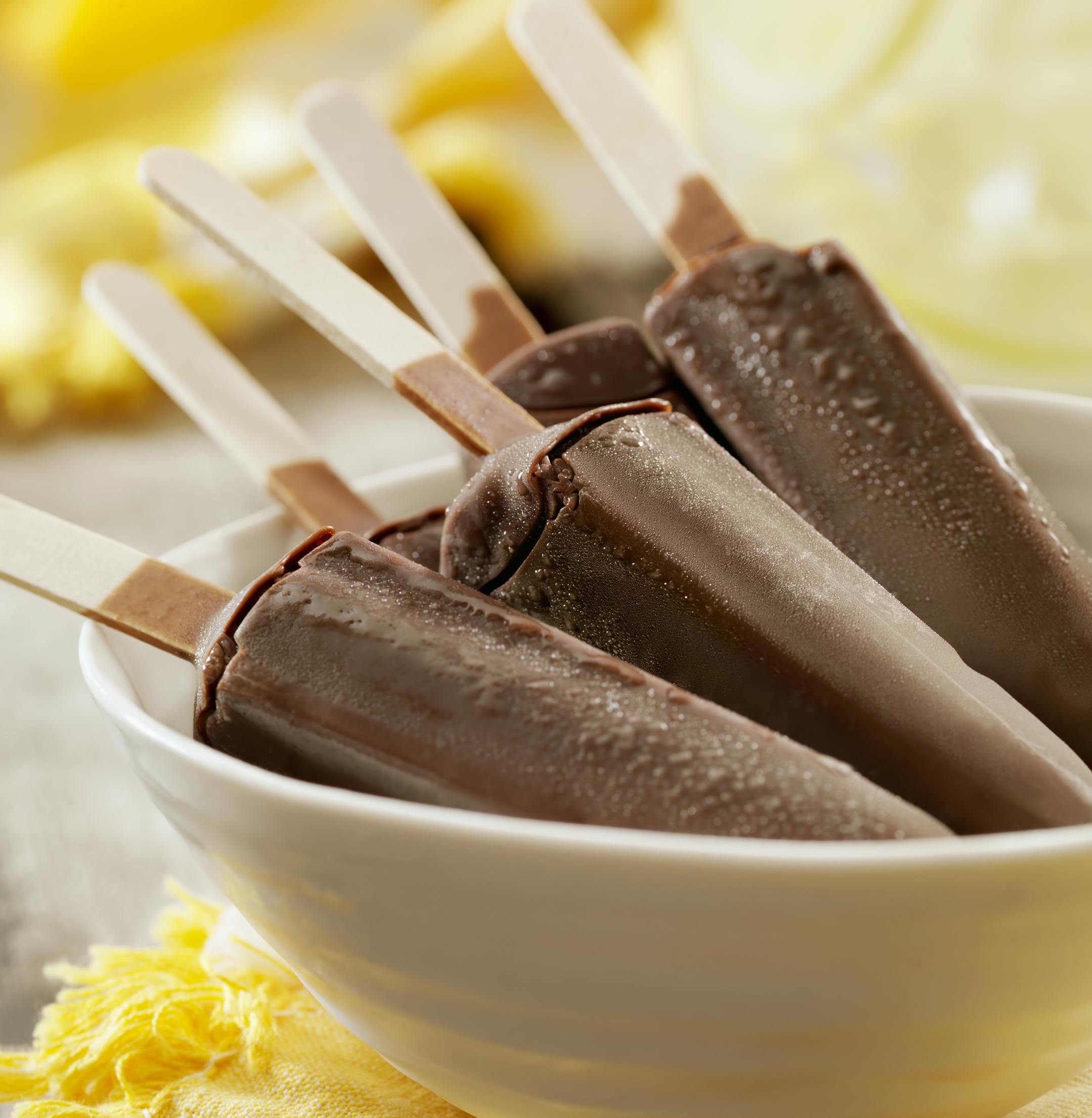 Chocolate and Fudge Popsicles at a Picnic with Lemonade in the Background- Photographed on Hasselblad H3D2-39mb Camera