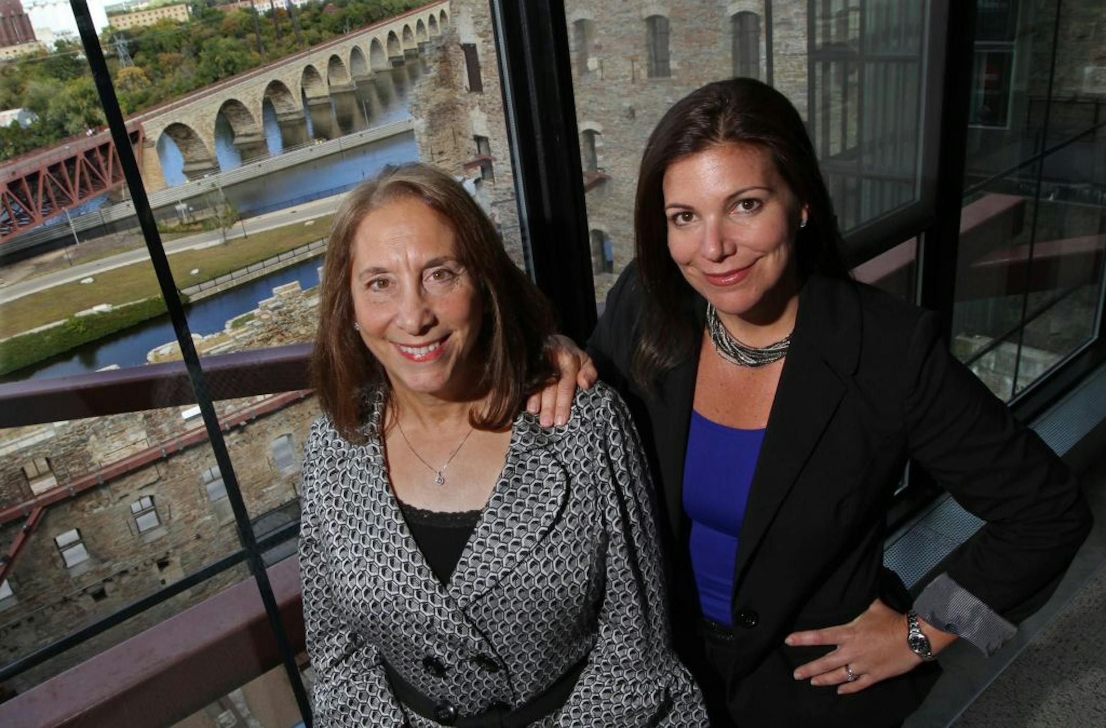 (left to right) Judy Kessel, StoneArch founder, board chair and Jessica Boden, president were photographed at the StoneArch offices overlooking the Mill Ruins building and stonearch bridge in downtown Minneapolis on 9/18/12.