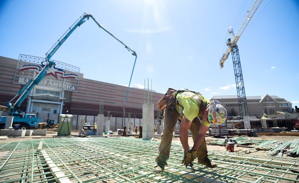 Jake Weller, 28, of White Bear Lake, works at the Mall of America expansion site in Bloomington, MN on Thursday, May 22, 2014.