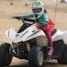 Nina Haley, 4, from San Francisco, rode on her own while her mother, Stacy Situ, watched from another ATV nearby at the Oceano Dunes State Vehicular R