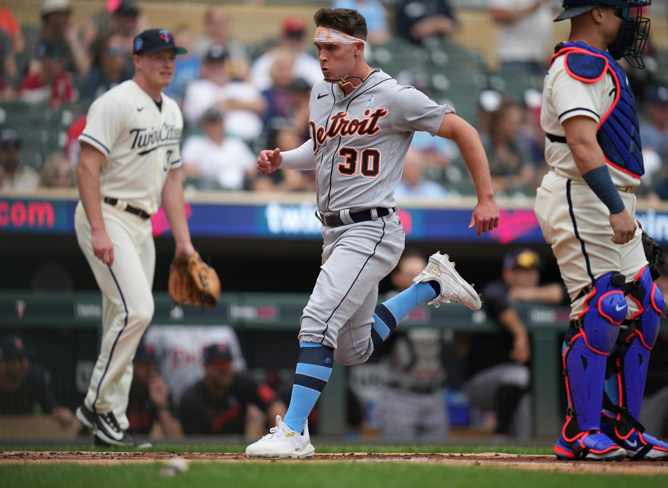Detroit Tigers right fielder Kerry Carpenter (30) scores in the first inning.Detroit Tigers right fielder Kerry Carpenter (30) scores in the first inning.