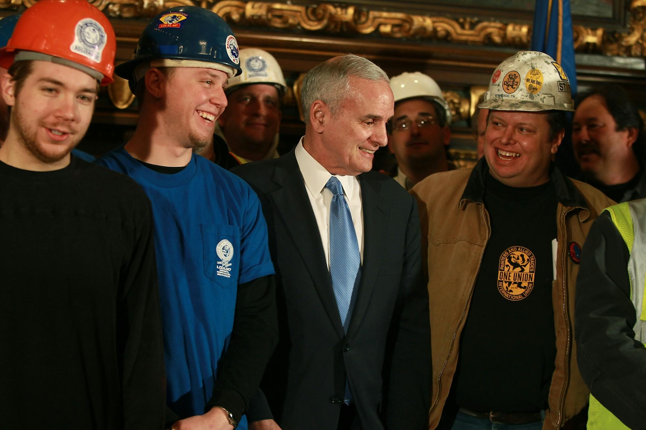 Gov. Mark Dayton announced his bonding picks while surrounded by union workers at the Capitol on Tuesday.