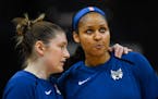 Minnesota Lynx guard Lindsay Whalen, left, talks with forward Maya Moore before a game earlier this week. Minnesota lost Saturday night in Chicago.