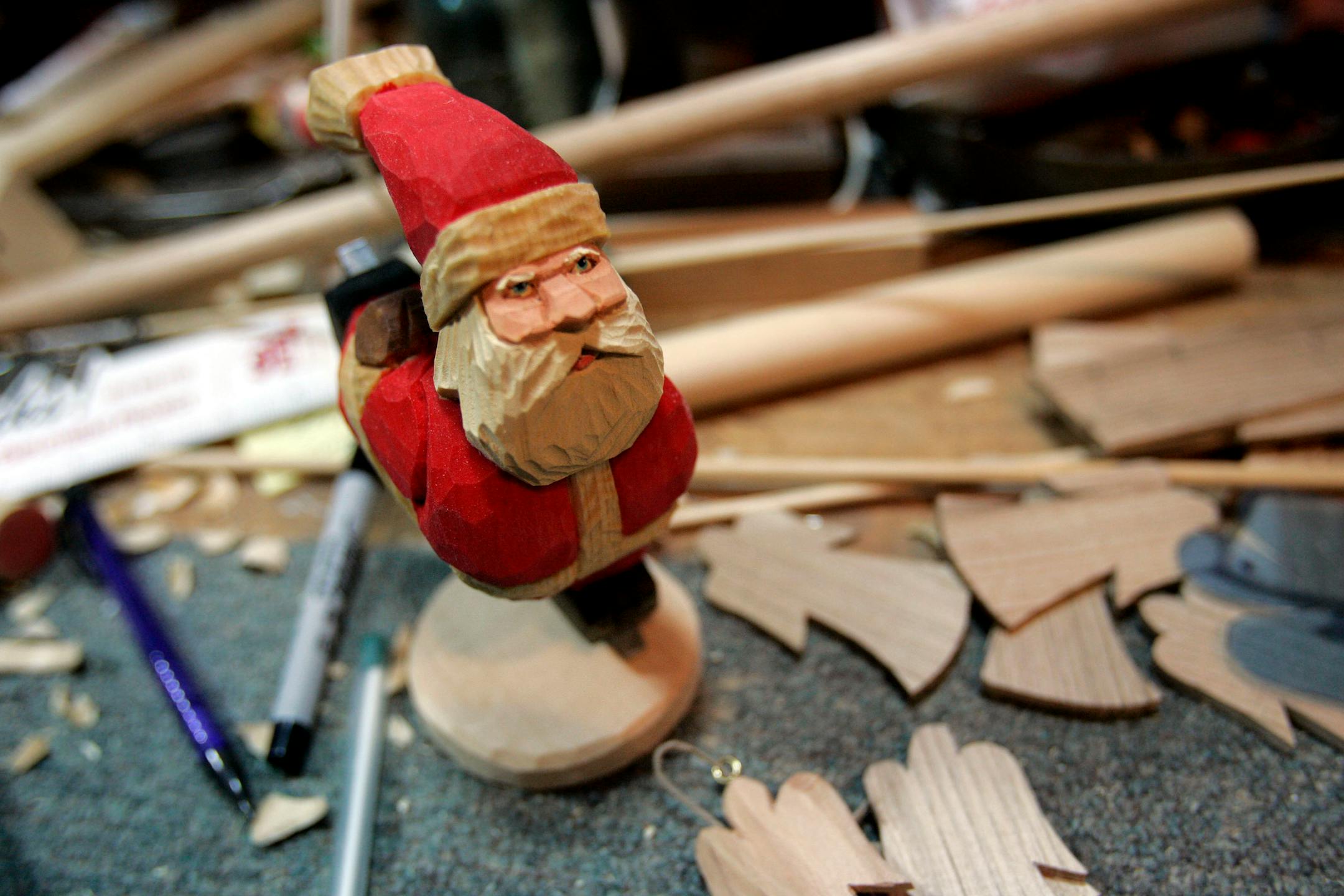 A skating Santa that Ron Nelson carved as a gift for his family. It was a return to his childhood home that launched his work.