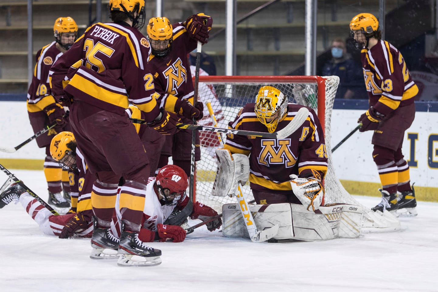 Minnesota goaltender Jack LaFontaine (45) makes a save against Wisconsin during the championship game of the Big Ten men's hockey tournament Tuesday, March 16, 2021, in South Bend, Ind. (John Mersits/South Bend Tribune via AP)