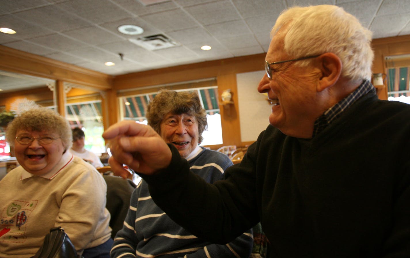 Donovan Johnson, right, laughed with Helen Peterson, middle, and Lois Kovach during their weekly meeting at the Richfield Baker's Square. This group from Emmanuel Lutheran Church has been meeting for 50 years.