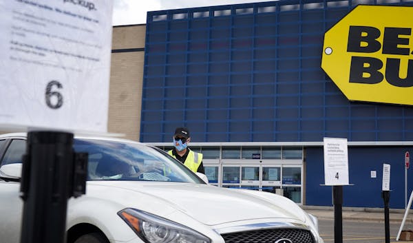 Best Buy employees met customers in the parking lot, bringing purchases to their cars for curbside pickup at the Apple Valley store. Best Buy will beg