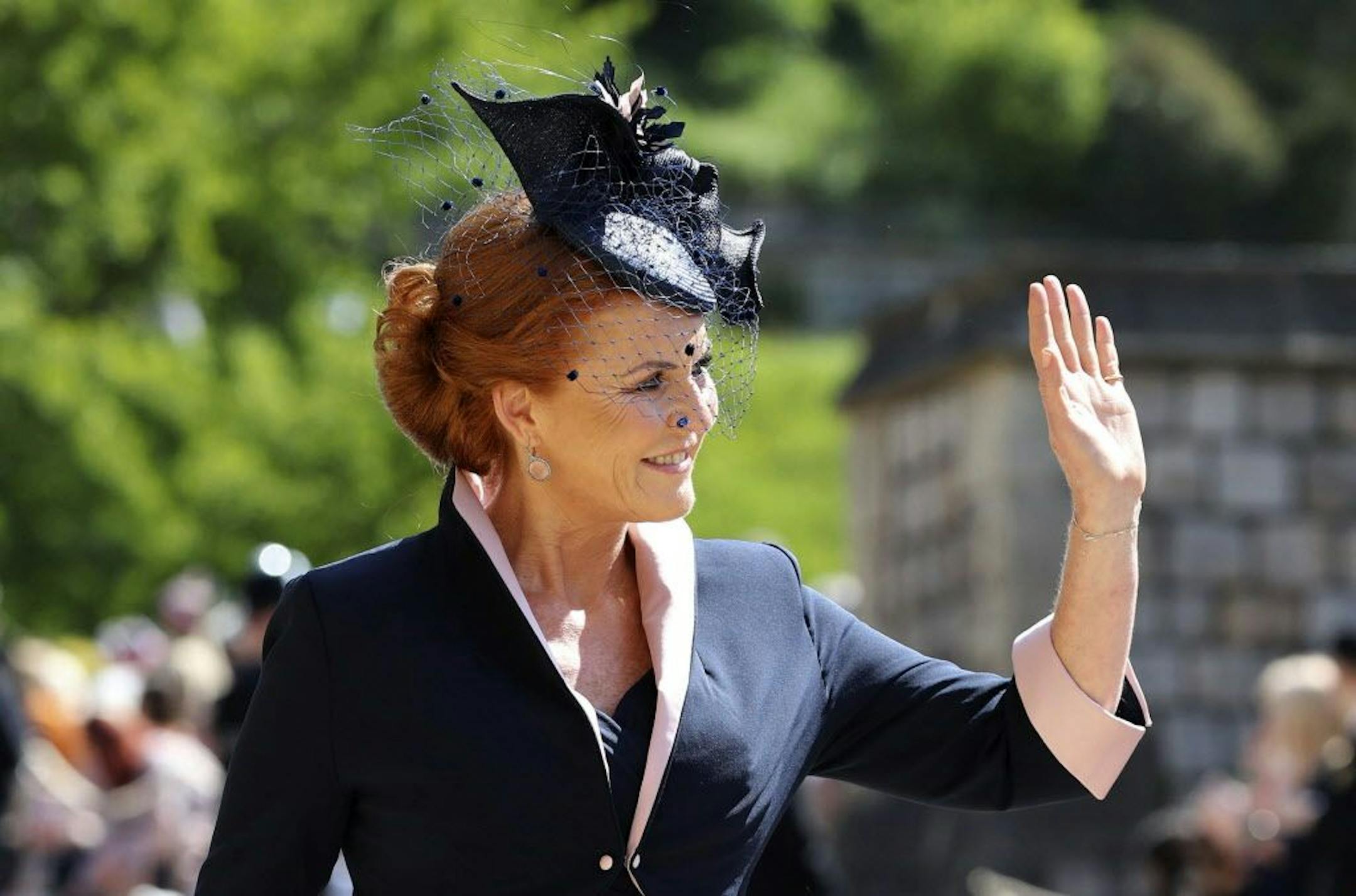 Sarah Ferguson arrives for the wedding ceremony of Prince Harry and Meghan Markle at St. George's Chapel in Windsor Castle in Windsor, near London, England, Saturday, May 19, 2018.
