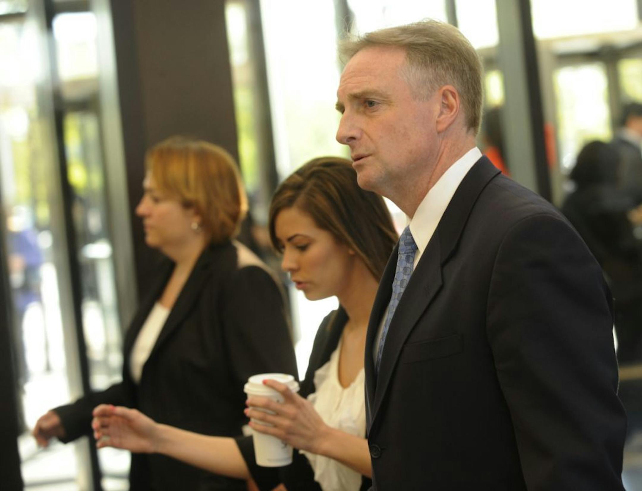 Lead prosecutor James McKay walks to court at the Cook County Criminal Court on the first day of the murder trial of William Balfour, in Chicago, Monday, April 23, 2012. Balfour is charged in the 2008 murder of Oscar winning actress and singer Jennifer Hudson's mother, brother and nephew.