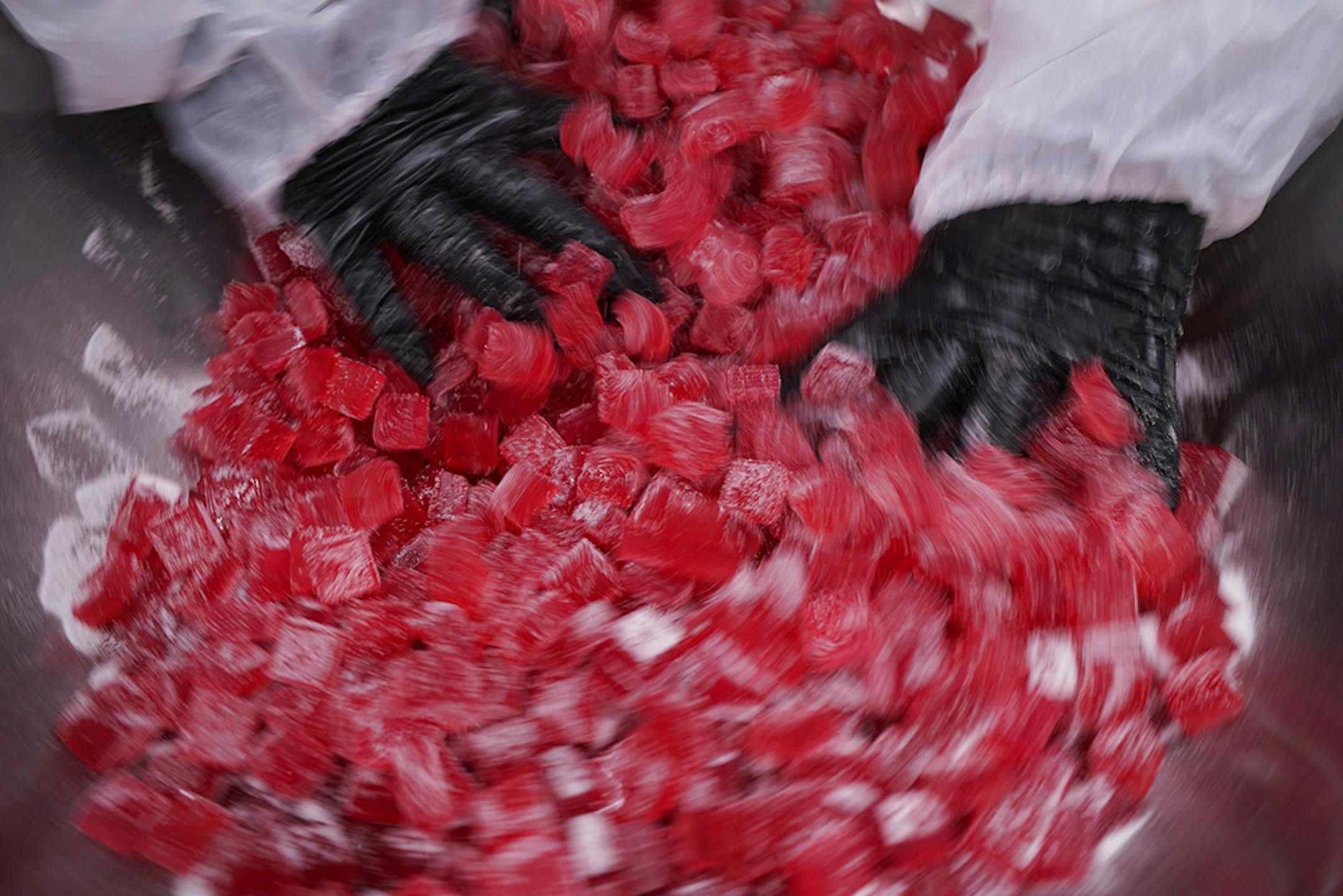 An employee mixes in the sugar coating to a batch of cannabis-infused gummies at the Wana Brands plant in Boulder, Colorado. ] JEFF WHEELER • jeff.wheeler@startribune.com Wana Brands produces cannabis sour gummies at a plant near their headquarters in Boulder, CO. The plant was photographed Monday afternoon, February 25, 2019.