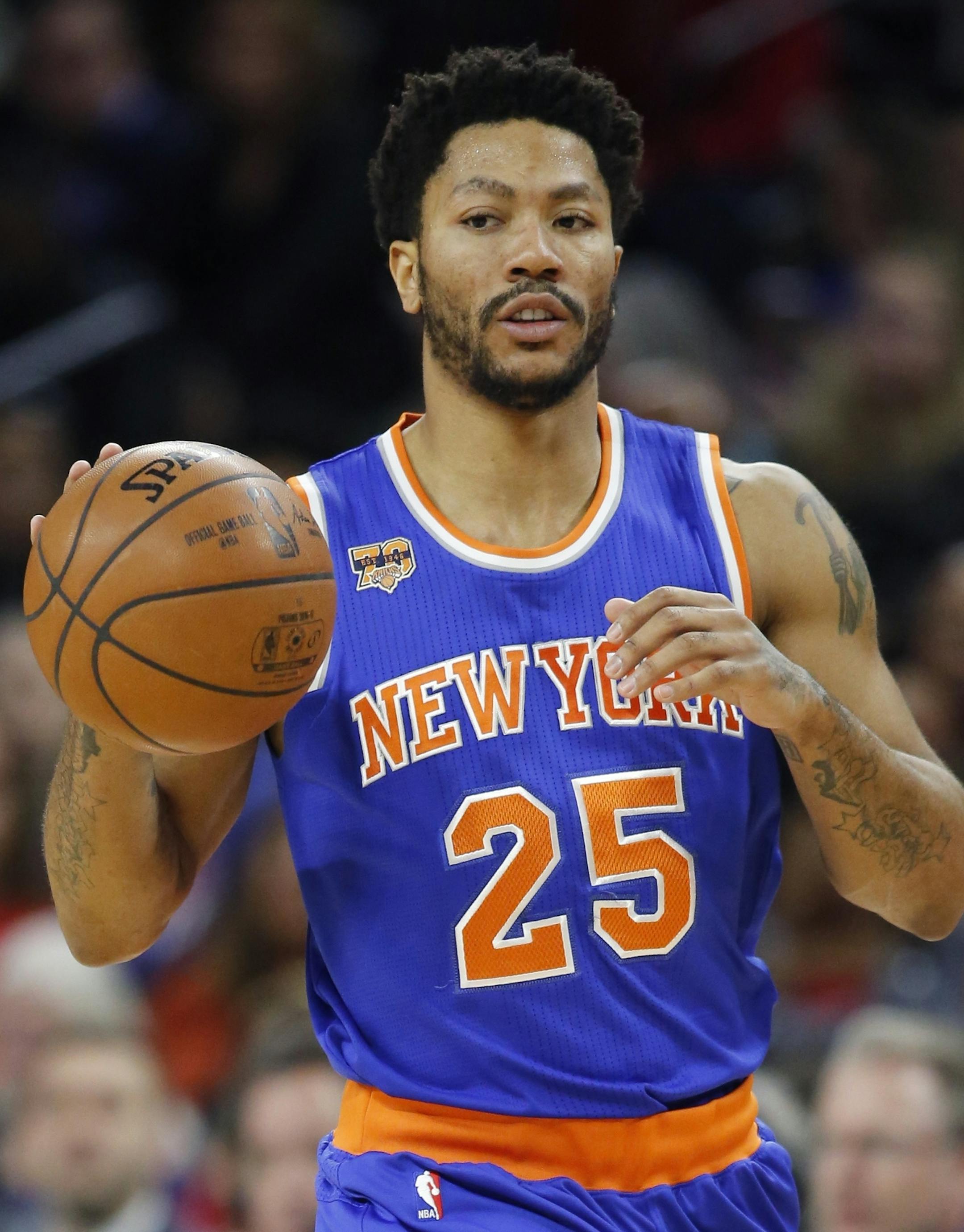 New York Knicks guard Derrick Rose brings the ball up court during the second half of an NBA basketball game against the Detroit Pistons, Saturday, March 11, 2017, in Auburn Hills, Mich. (AP Photo/Carlos Osorio) ORG XMIT: otkco113
