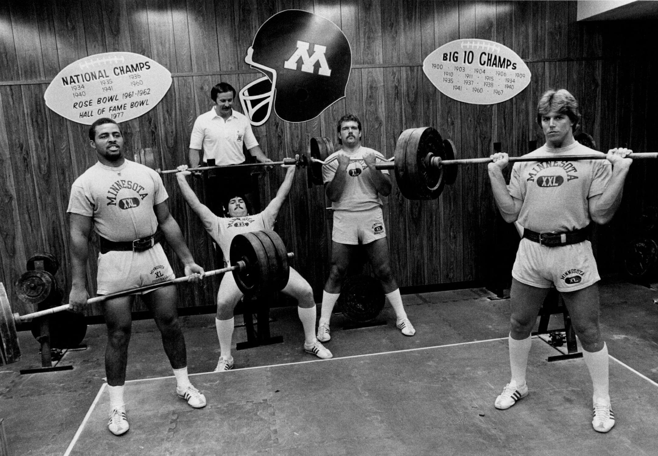 September 7, 1980 Thatâ€™s not the University of Minnesota weightlifting team, but memÂ­bers of the Gophers football team, working out to get not only bigger and stronger but quicker, as well. The four are, left to right, William Humphries, Ken Dallafior, Kent Penovlch and Ed Olson. Bob Rohde, the teamâ€™s weight-training coordinator, provided an assist for DallaÂ­fior. Art Hager, Minneapolis Star Tribune