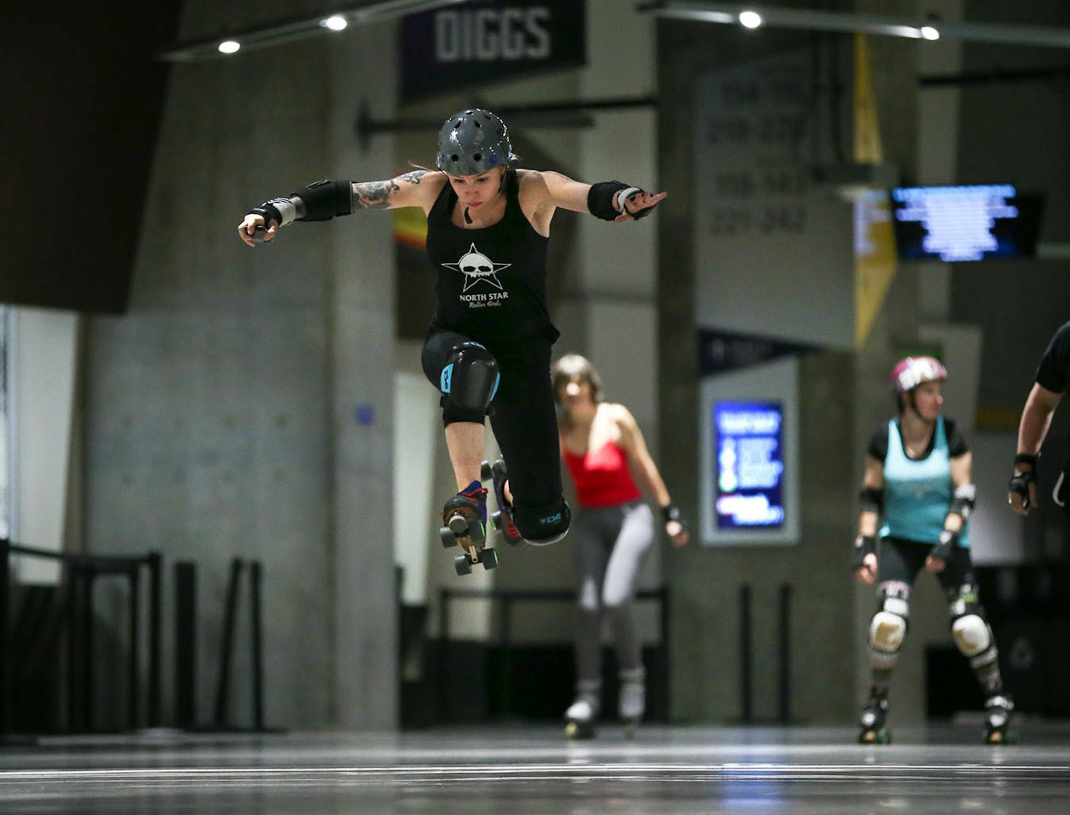 Dana Johnson of Dayton, who skates for the North Star Roller Girls as Val Kyrie, jumped over one of the expansion joints in the floor of the concourse. ] JEFF WHEELER ï jeff.wheeler@startribune.com Inline skating has begun in the concourse of U.S. Bank Stadium with more dates added through March 2017 due to popular demand. Hundreds of people skated during the family period from 5- 7 p.m. Tuesday night, December 27, 2016.