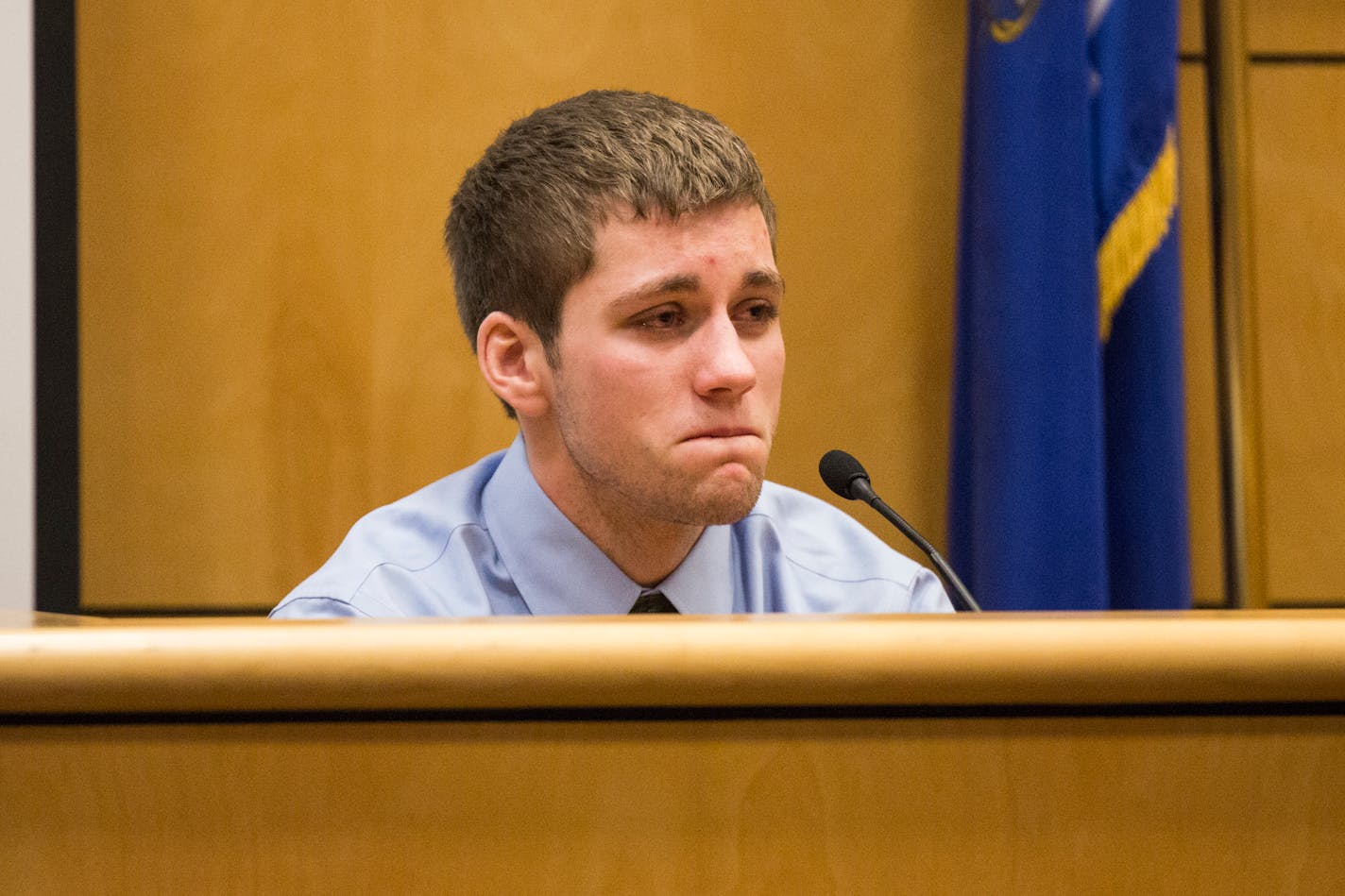 Levi Acre-Kendall breaks down while testifying during his trial in Polk County Circuit Court in Balsam Lake on Friday, December 11, 2015.