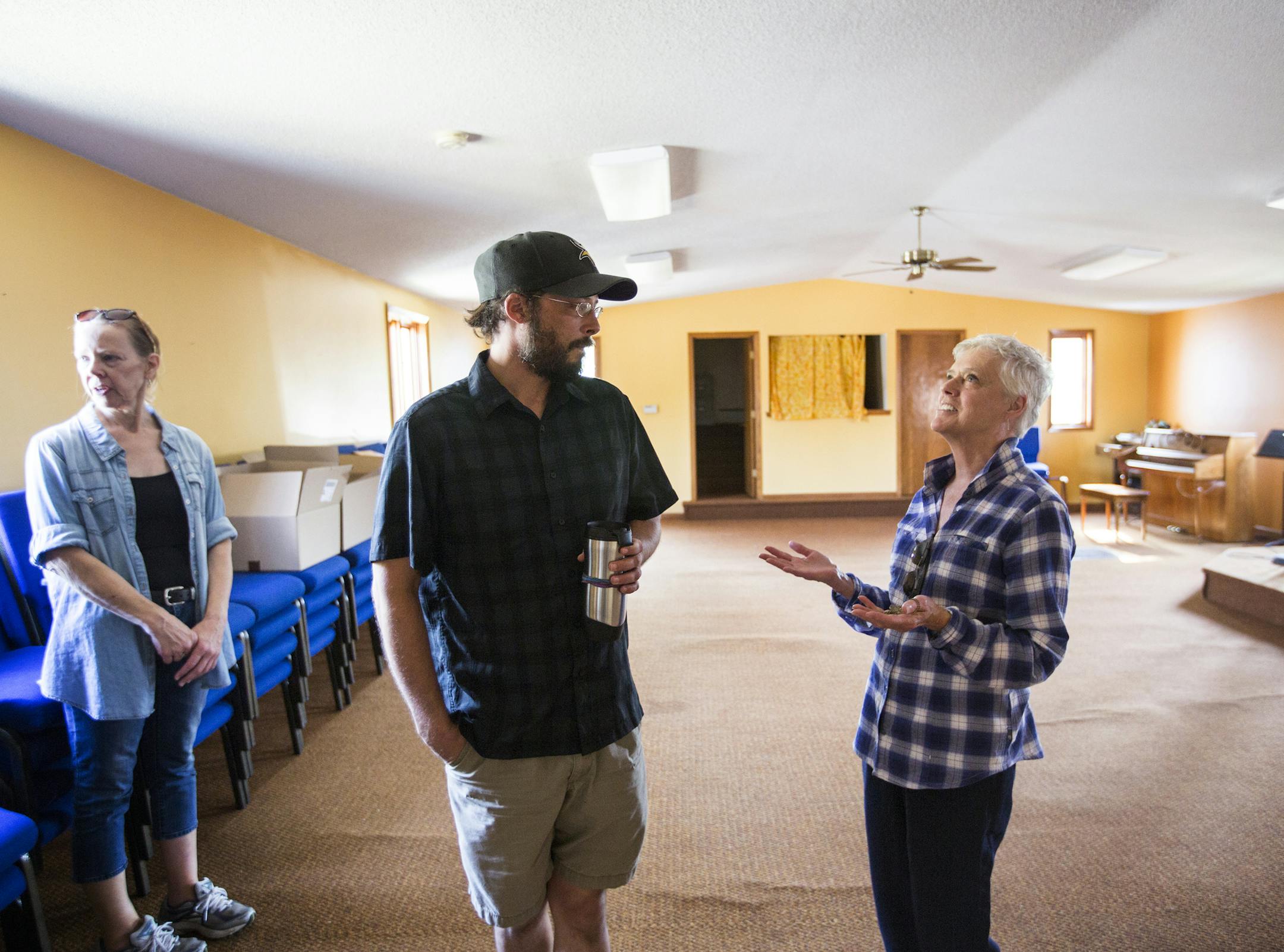 Nameless Coalition for the Homeless board members Kristi Miller, from left, Reed Olson and Keni Johnson stand inside the space that will be soon be a seasonal shelter for the homeless in downtown Bemidji on Friday, August 14, 2015. ] LEILA NAVIDI leila.navidi@startribune.com / BACKGROUND INFORMATION: The Nameless Coalition for the Homeless, an advocacy group in Bemidji, raised money to purchase a building after seeing a great need in the community for a homeless shelter in Bemidji that accepts p