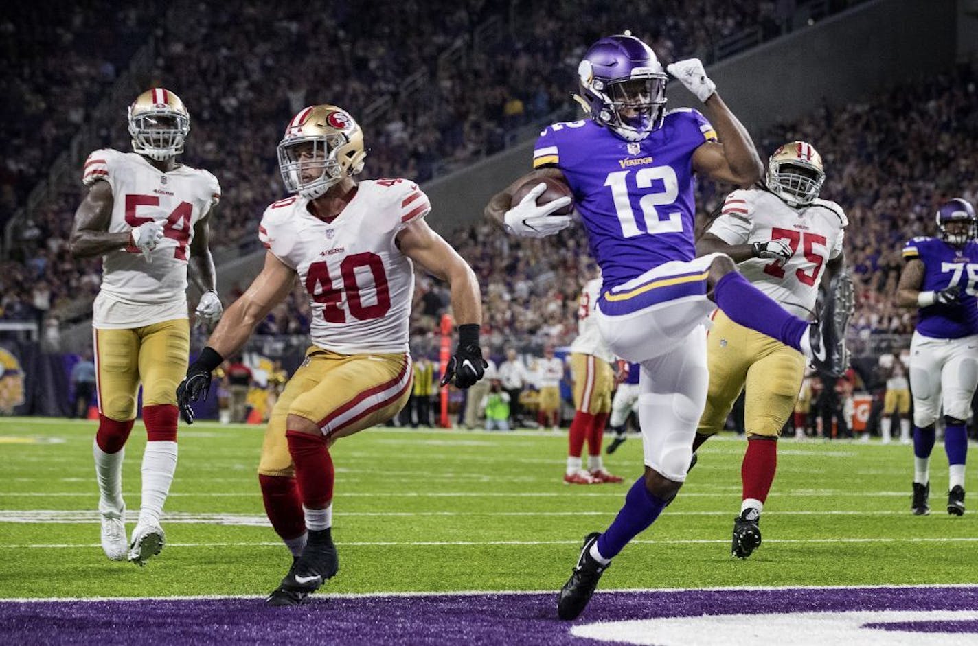 Rodney Adams (12) ran in end zone for a 9 yard touchdown in the third quarter.