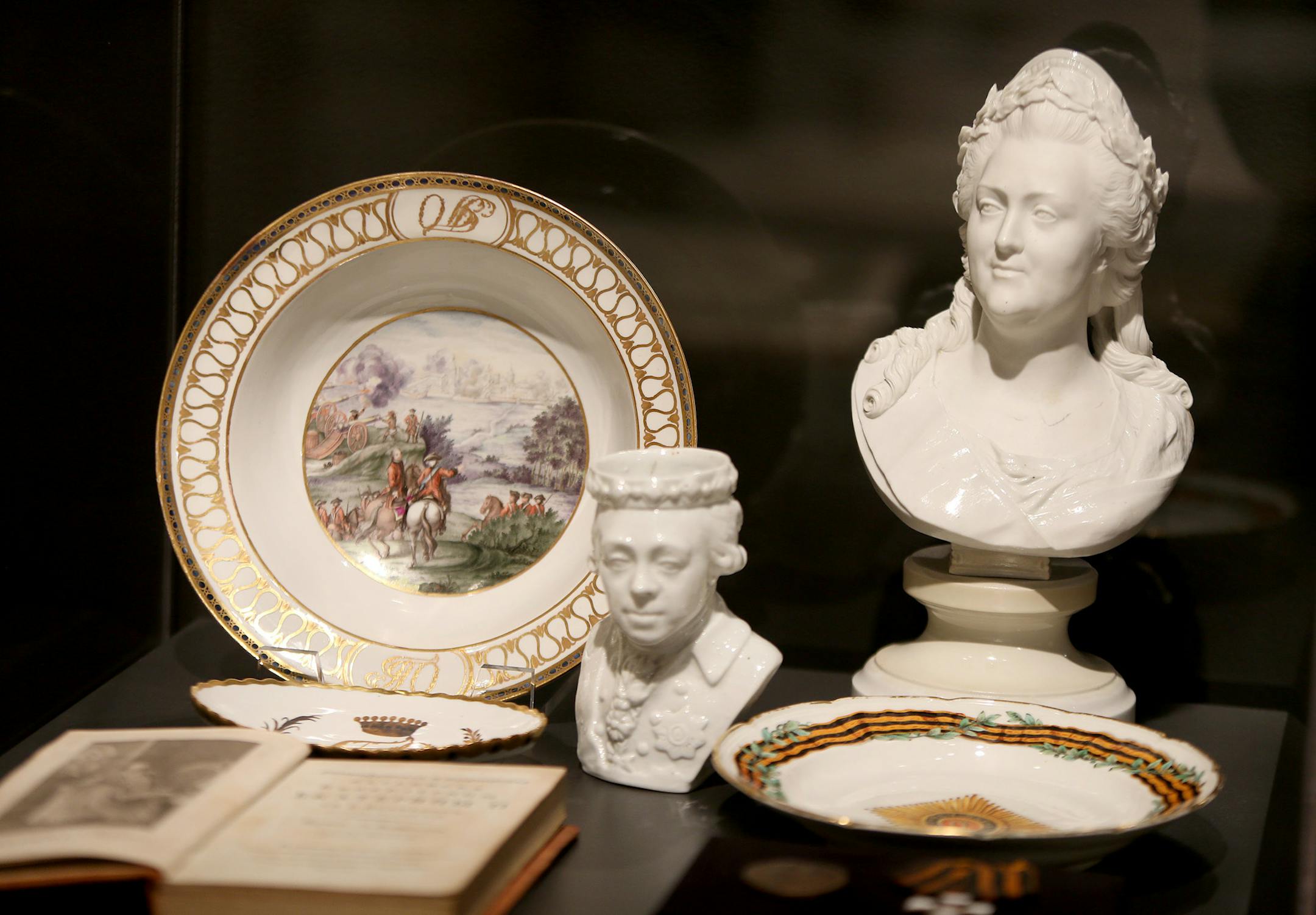 Curator Masha Zavialova prepared "The Romanovs: Legacy of an Empire Lost," at the Museum of Russian Art, Friday, November 15, 2013. The show is of memorabilia of three centuries of costumes, photos, paintings, books, jewelry from 15 museums and private collections, documenting the history of Russia's czars whose rule ended in bloody revolution of 1917. (ELIZABETH FLORES/STAR TRIBUNE) ELIZABETH FLORES • eflores@startribune.com