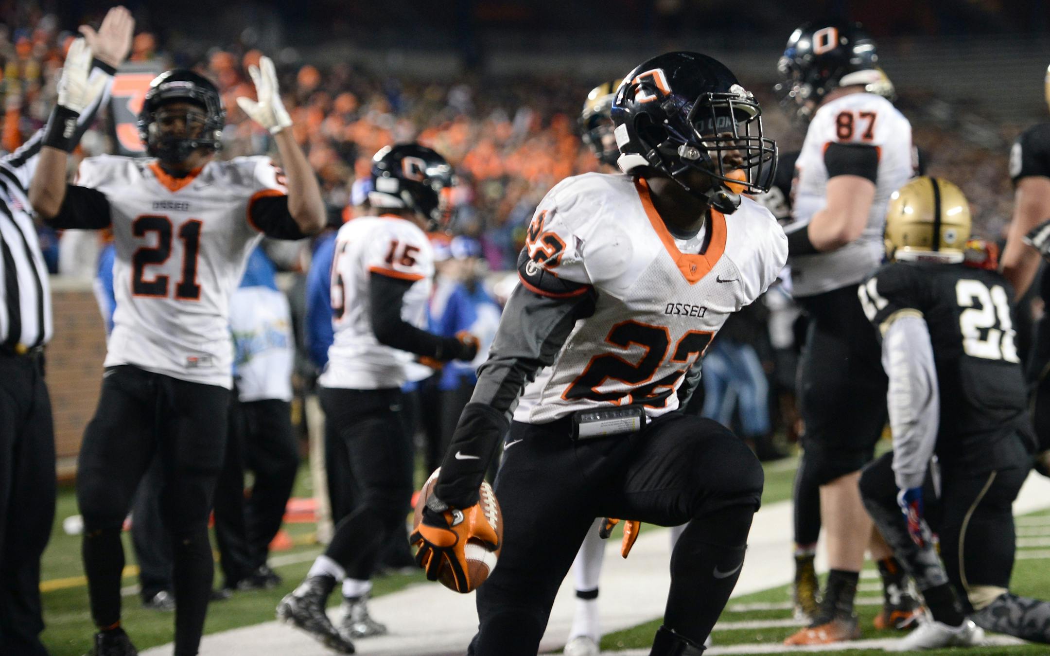 Osseo running back Prince Kruah (22) celebrated his game-tying touchdown in the final minute of his team's 6A championship game against East Ridge. ] (AARON LAVINSKY/STAR TRIBUNE) aaron.lavinsky@startribune.com Osseo played East Ridge in the Class 6A championship game on Friday, Nov. 13, 2015 at TCF Bank Stadium.