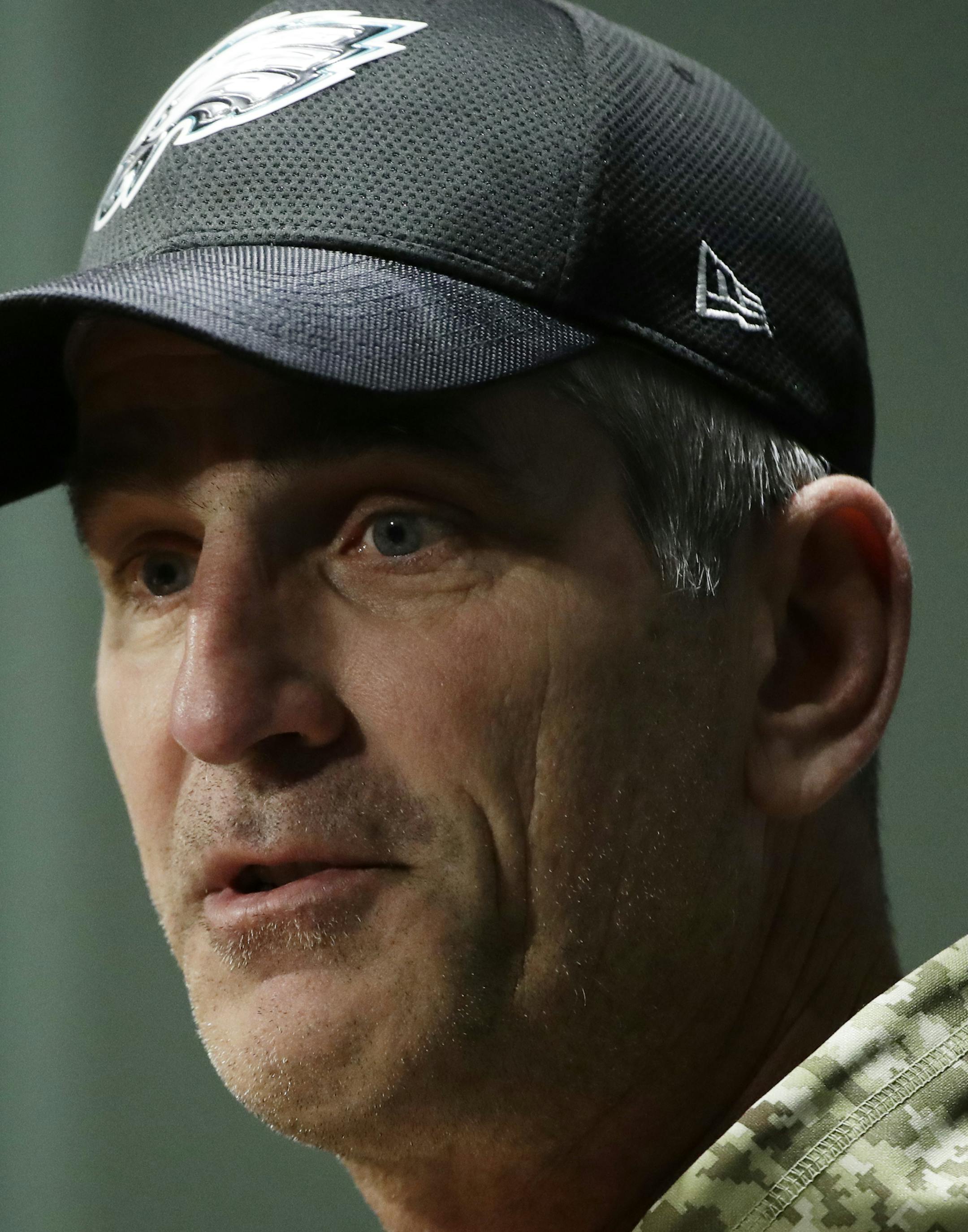FILE - This Dec. 12, 2017 file photo shows Philadelphia Eagles offensive coordinator Frank Reich speaking with members of the media during a news conference at the team's NFL football training facility in Philadelphia. The Indianapolis Colts have hired Reich as their new head coach. Team officials made the announcement Sunday, Feb. 11, 2018. Reich is expected to be introduced at a news conference Tuesday. (AP Photo/Matt Rourke, file)