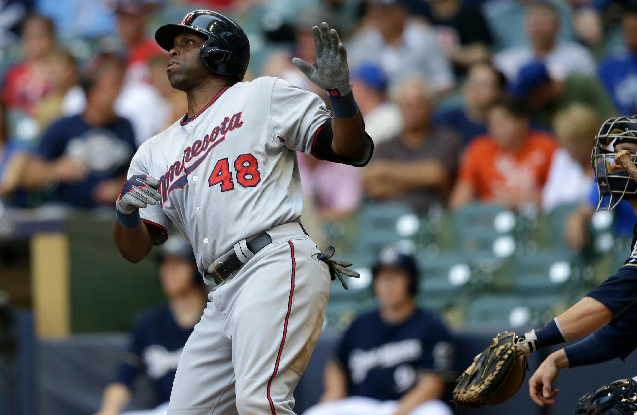 The Twins' Torii Hunter watched his home run during the sixth inning of Saturday's 5-2 win at Milwaukee. Hunter also homered in the ninth.
