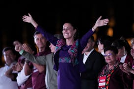 President-elect Claudia Sheinbaum waves to supporters at the Zocalo, Mexico City's main square, after the National Electoral Institute announced she h