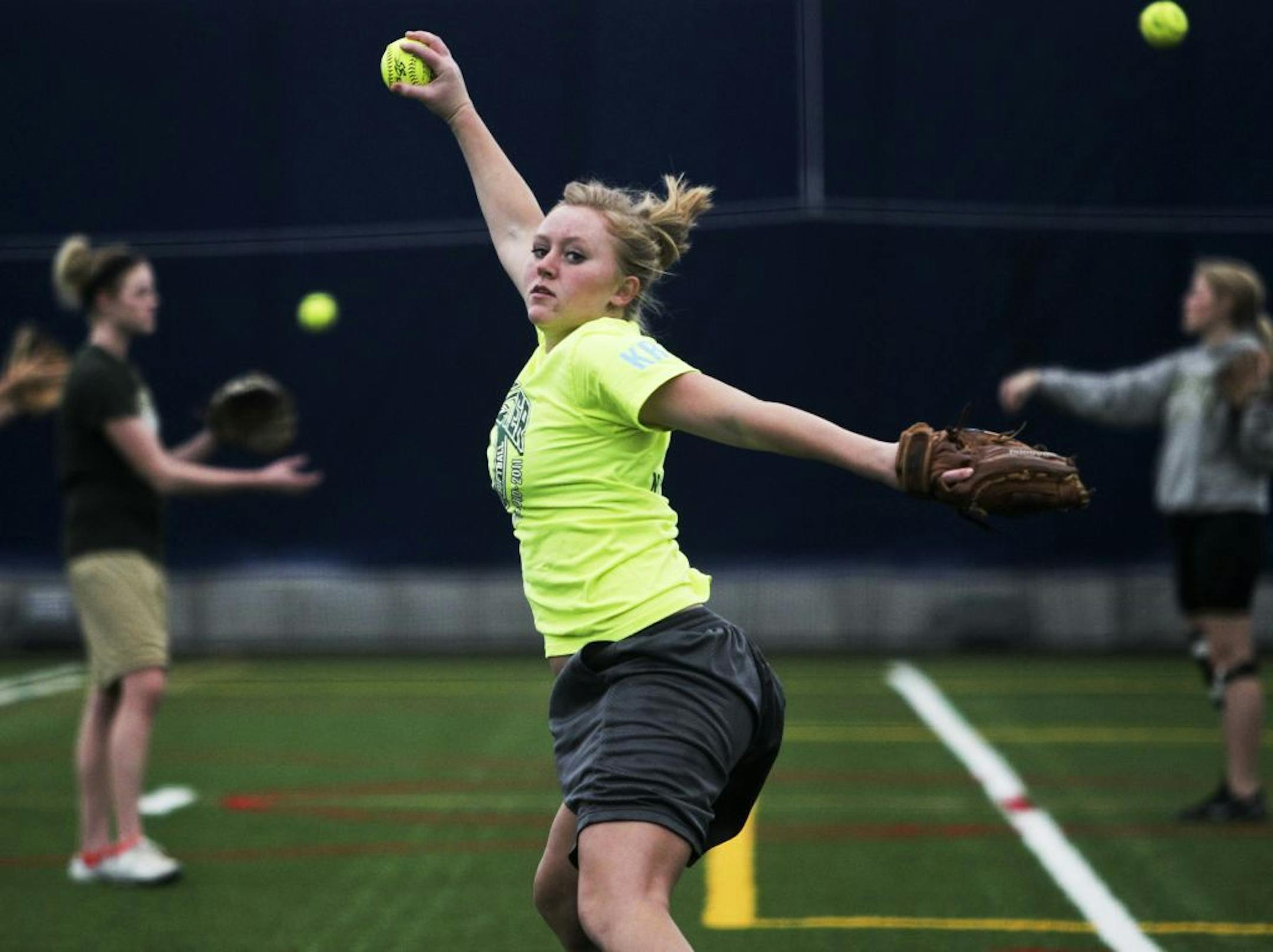 Park Center pitcher Nicola Tade warmed up last week during practice at the Maple Grove Sports Dome. Tade threw a five-inning perfect game against Albany in the Class 2A quarterfinals last season, helping the Pirates claim the title. Photos by DAVID JOLES • djoles@startribune.com