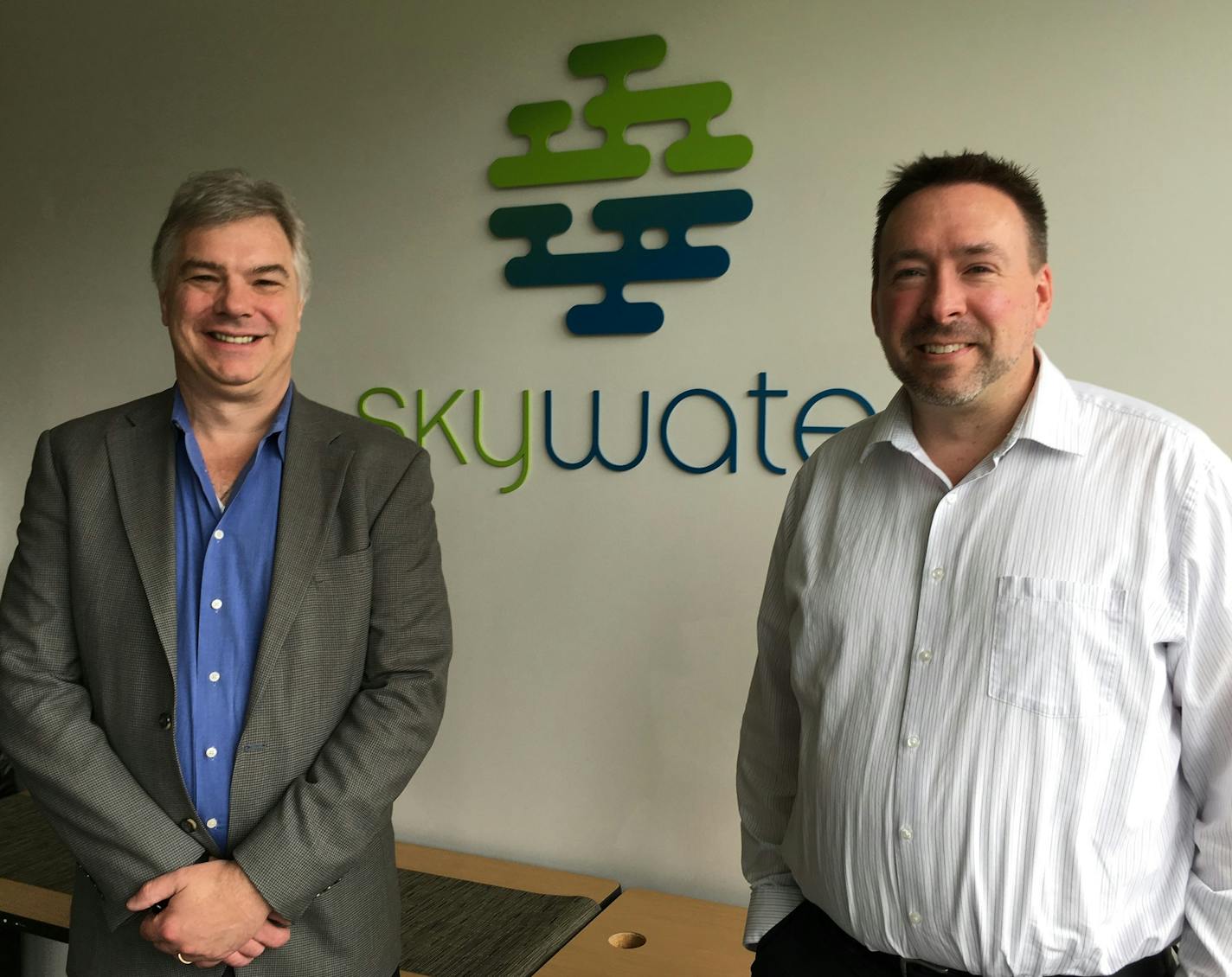 Thomas Sonderman, left, president of Skywater Technology, and Brad Ferguson, senior director of sales, at the company's Bloomington office and fab. Minnesota's only chipmaker won a three-year contract to work with DARPA and university researchers on processes to build 3-D system-on-chip semiconductors.