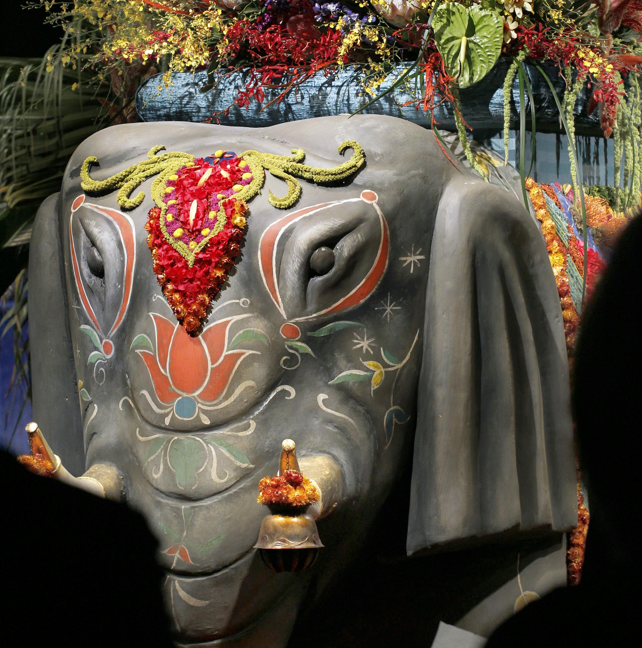 The flowers draped over the Elephant. Macy's/Bachman's 2013 flower show, "The Painted Garden", on the 8th floor of Downtown Macy's Minneapolis store. This years shops has the vibrant colors of South Asia. [ STAR TRIBUNE/TOM WALLACE Assignments #20028088B March 22, 2013 SLUG 663963 FLOWERSHOW032713 EXTRA INFORMATION Kim Palmer reporter.