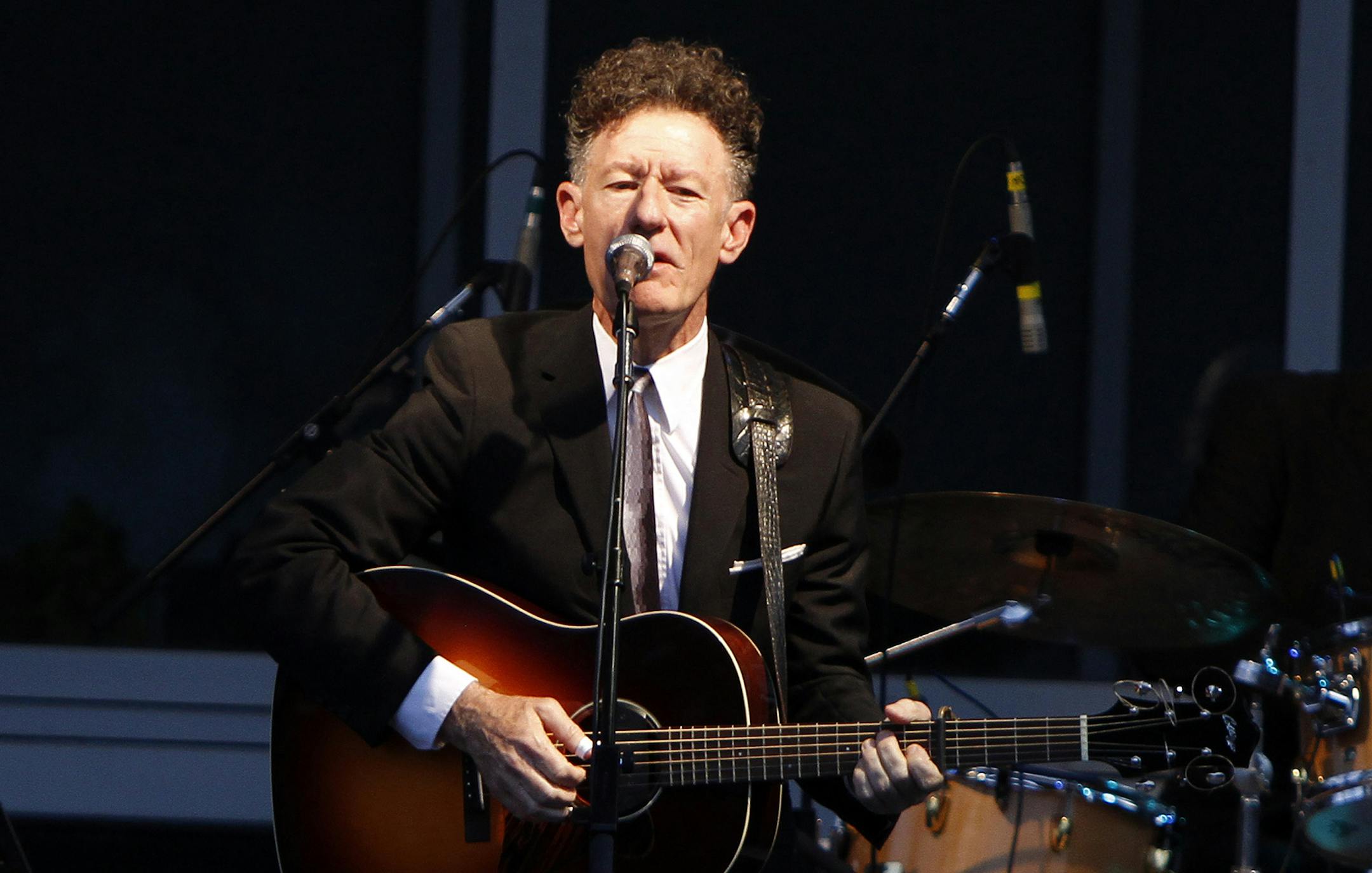Americana/Roots/Folk singer and songwriter Lyle Lovett performed at The Atlanta Botanical Gardens on Friday, July 26, 2013, in Atlanta, GA. The sold-out crowd enjoyed his hits and stories from his career while dining out under the stars on the lawn. (Photo by Dan Harr/Invision/AP Images) ORG XMIT: 04181313242
