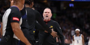 Denver coach Michael Malone was livid in the first quarter as he confronted referee Marc Davis after a no-call.