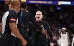 Denver coach Michael Malone was livid in the first quarter as he confronted referee Marc Davis after a no-call.