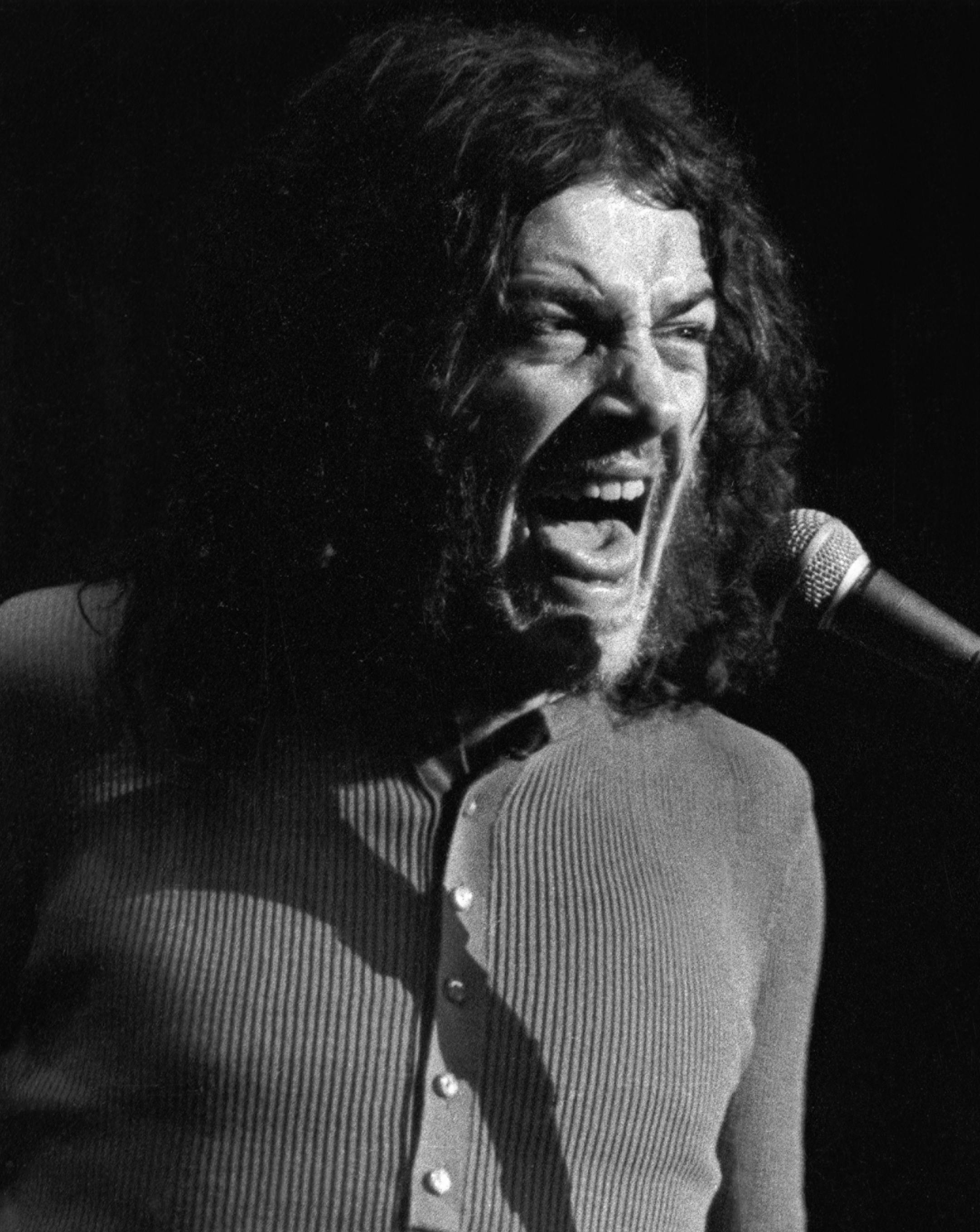 FOR ONE TIME USE ONLY WITH OBITUARY - In this June 1970 photo released by Linda Wolf, British singer Joe Cocker performs during the Joe Cocker - Mad Dogs & Englishmen tour and traveling party. Cocker, the raspy-voiced British singer known for his frenzied cover of "With a Little Help From My Friends," and the teary ballad "You Are So Beautiful," died of lung cancer on, Monday, Dec. 22, 2014 in Colorado. He was 70. (AP Photo/www.lindawolf.net, Linda Wolf)