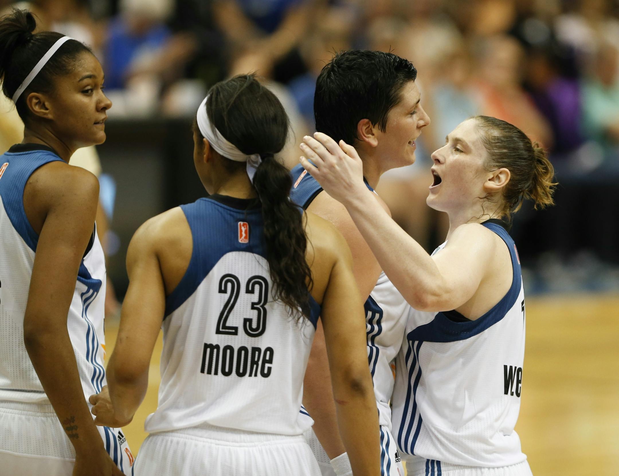 Lynx guard Lindsay Whalen, right, congratulated center Janel McCarville as she went to the line late in the fourth quarter against Seattle. McCarville made both her free throws to give the Lynx a 67-63 lead late.