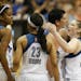 Lynx guard Lindsay Whalen, right, congratulated center Janel McCarville as she went to the line late in the fourth quarter against Seattle. McCarville